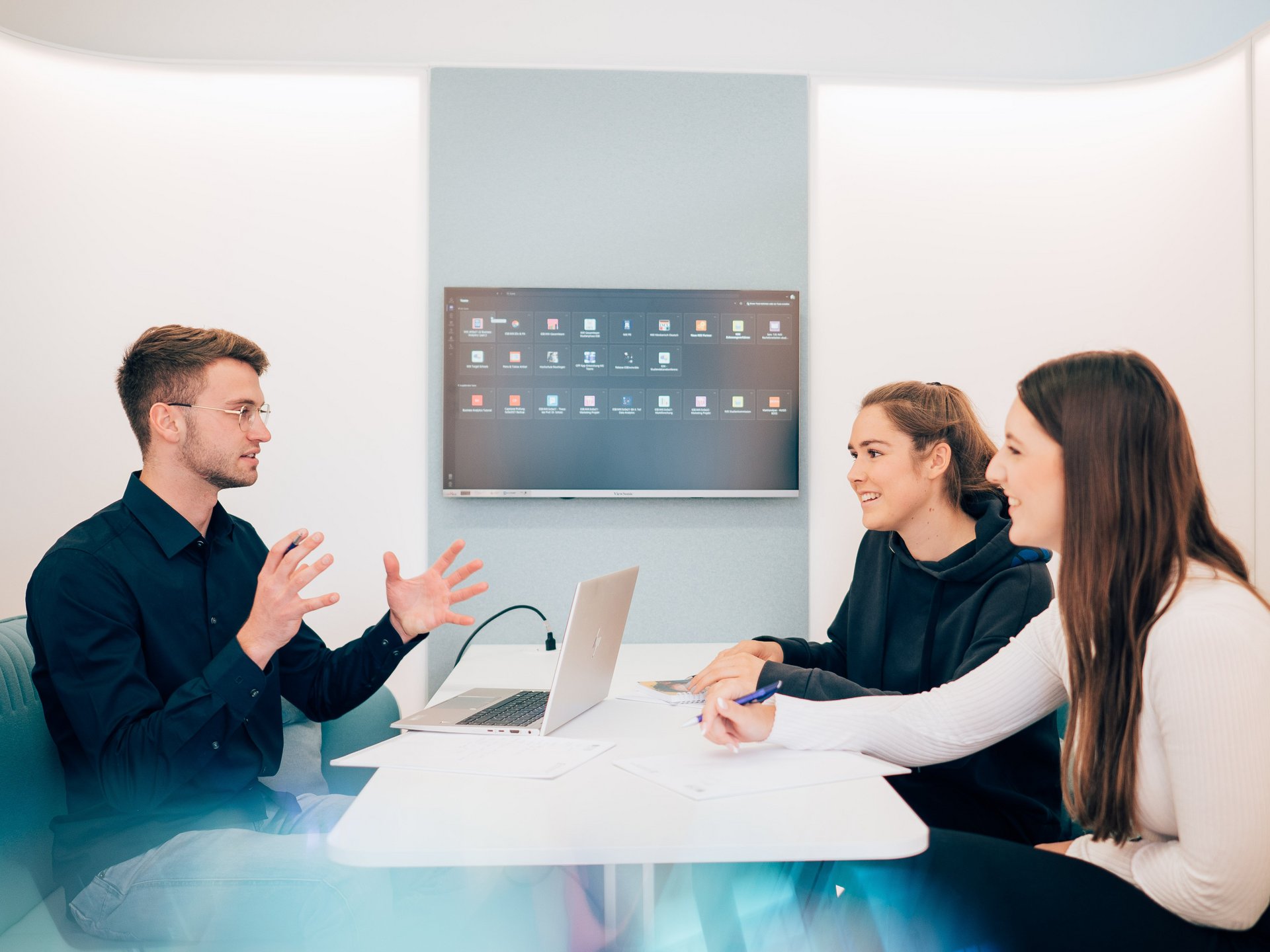 Students at ESB Business School working on a project in one of the library rooms