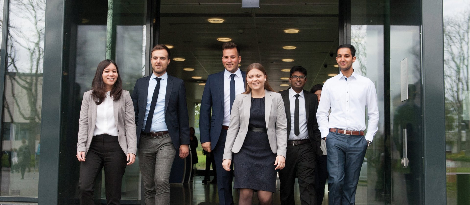 graduates visiting recruitment fair ESB Business School students leaving the library building